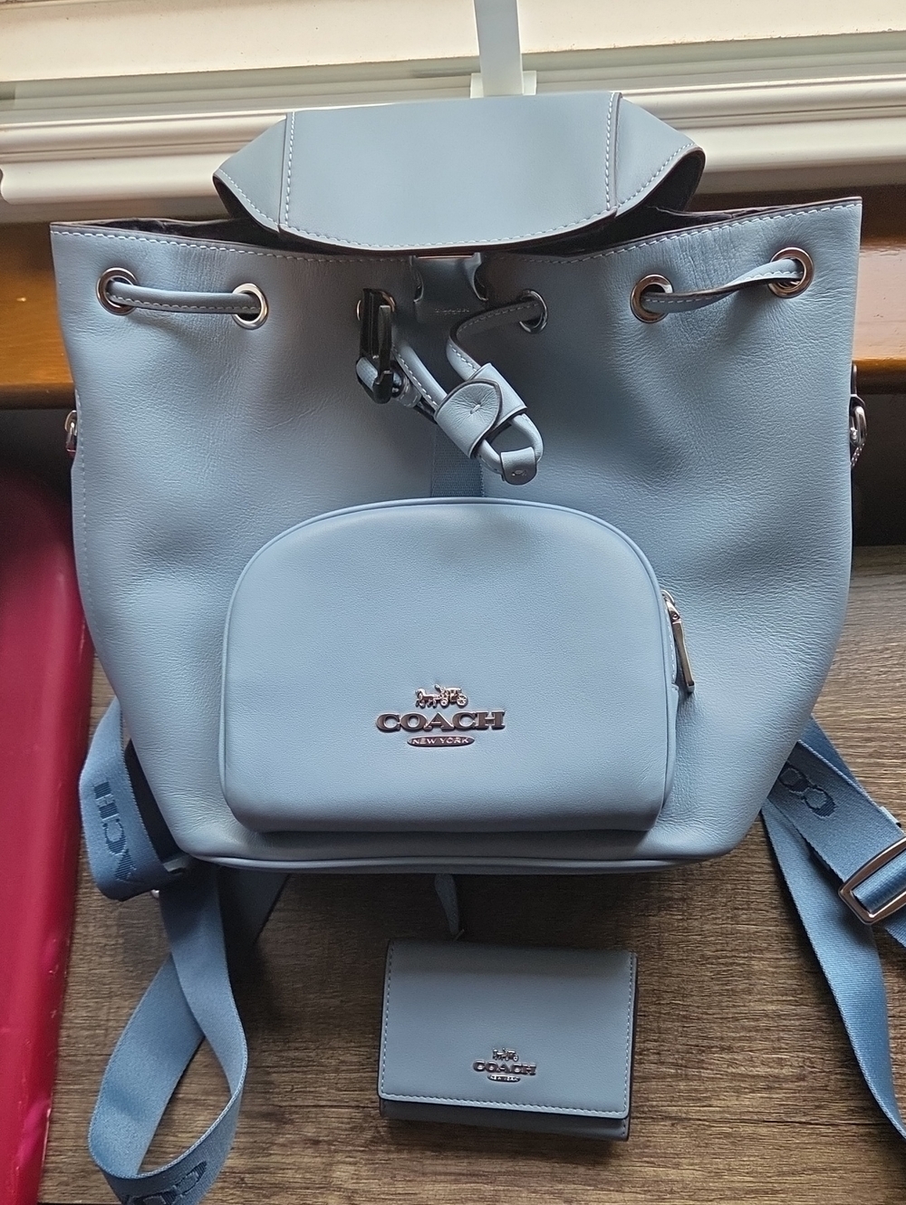 COACH Powder Blue Leather Drawstring Backpack with Front Pouch And Wallet